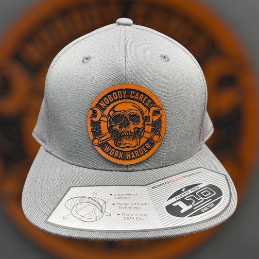 Nobody Cares Work Harder Leather Patch Yupoong 110 Cap - Laser Engraved